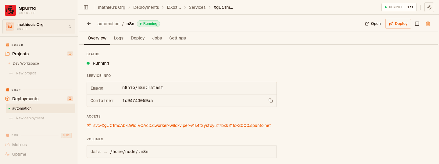 n8n service overview showing Running status, the n8nio/n8n:latest image, container id, auto-assigned access URL, and the data volume